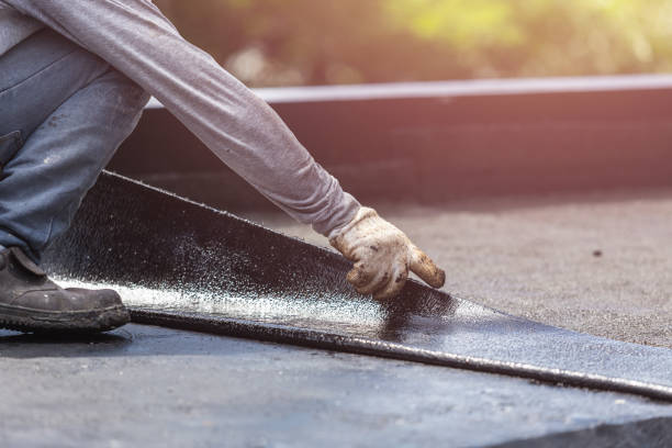 Professional Waterproofing technician working in Crooksville, OH